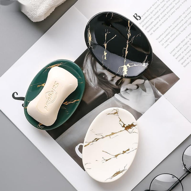 Oval sæbeholder i sort marmor-look