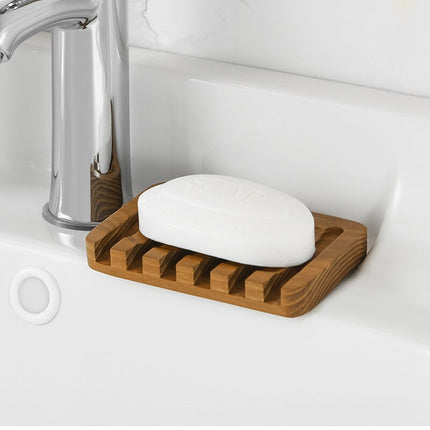 Sæbeskål i naturligt lyst træ