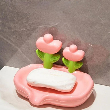 Keramisk sæbeholder med dekorative blomster