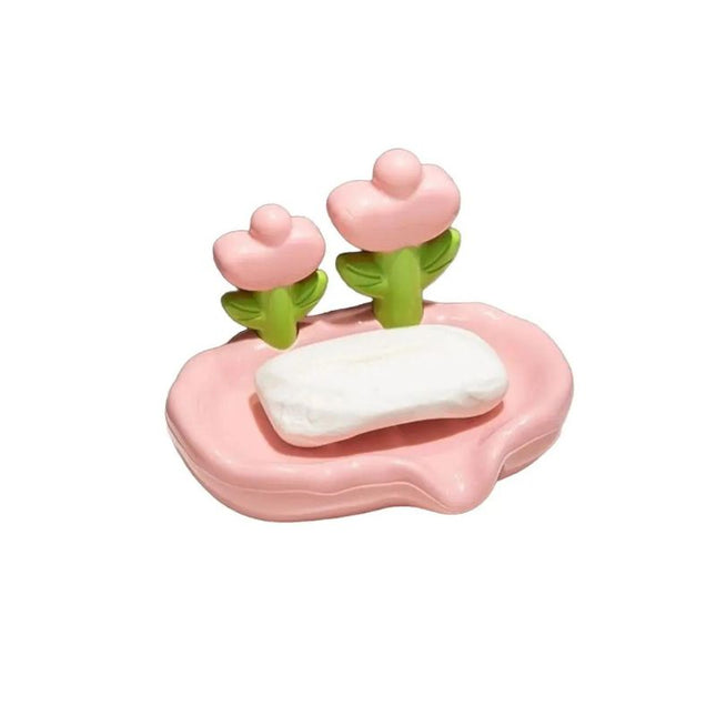 Keramisk sæbeholder med dekorative blomster