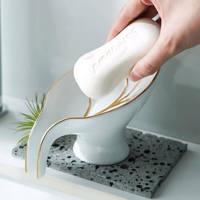 Elegant keramisk sæbeholder som blad