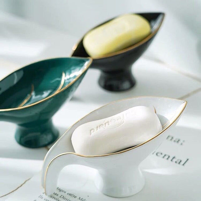 Elegant keramisk sæbeholder som blad