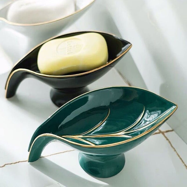 Elegant keramisk sæbeholder som blad