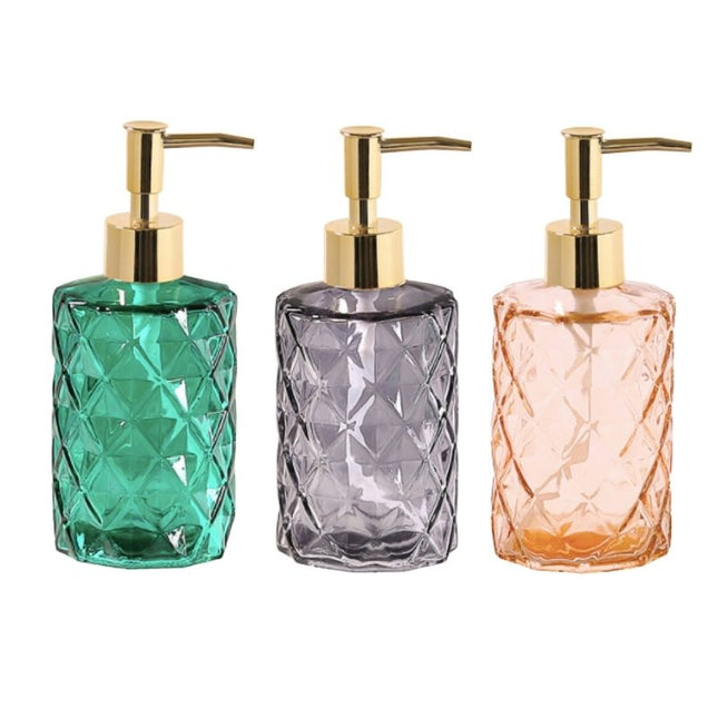 Sæbedispenser i røgfarvet glas med guldpumpe