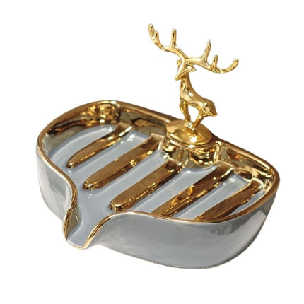 Dekorativ sæbeskål med guldfarvet hjort