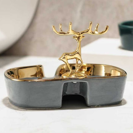 Dekorativ sæbeskål med guldfarvet hjort