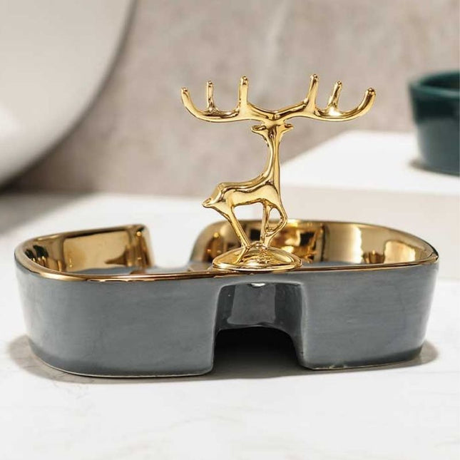 Dekorativ sæbeskål med guldfarvet hjort