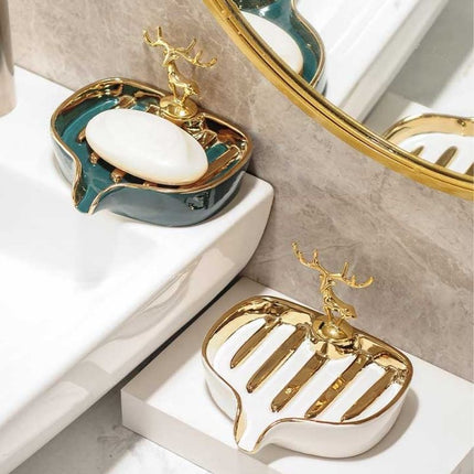 Dekorativ sæbeskål med guldfarvet hjort