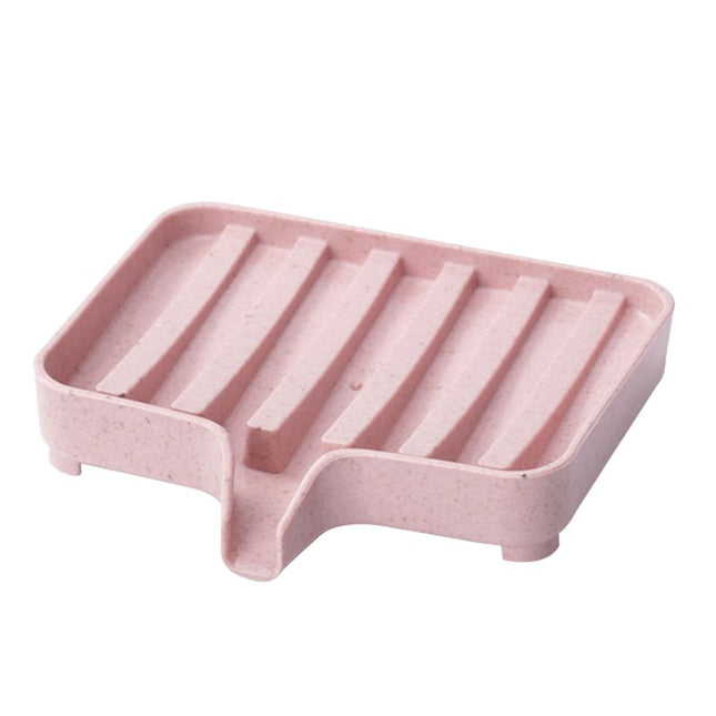 Selvdrænende sæbeholder til køkkenvask