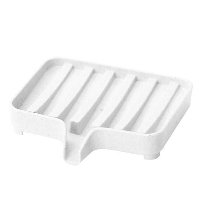 Selvdrænende sæbeholder til køkkenvask