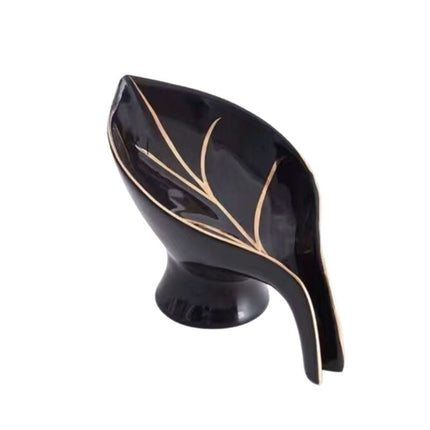 Elegant keramisk sæbeholder som blad