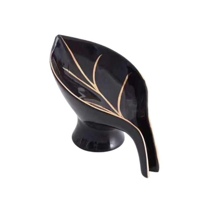 Elegant keramisk sæbeholder som blad
