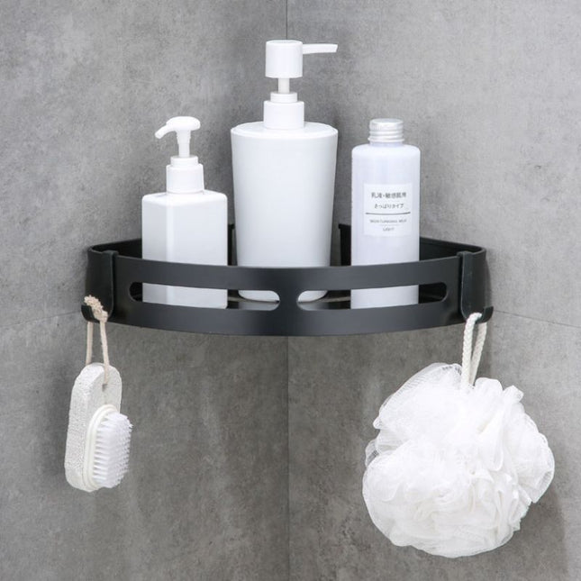 Sort hjørnehylde i metal til bruser